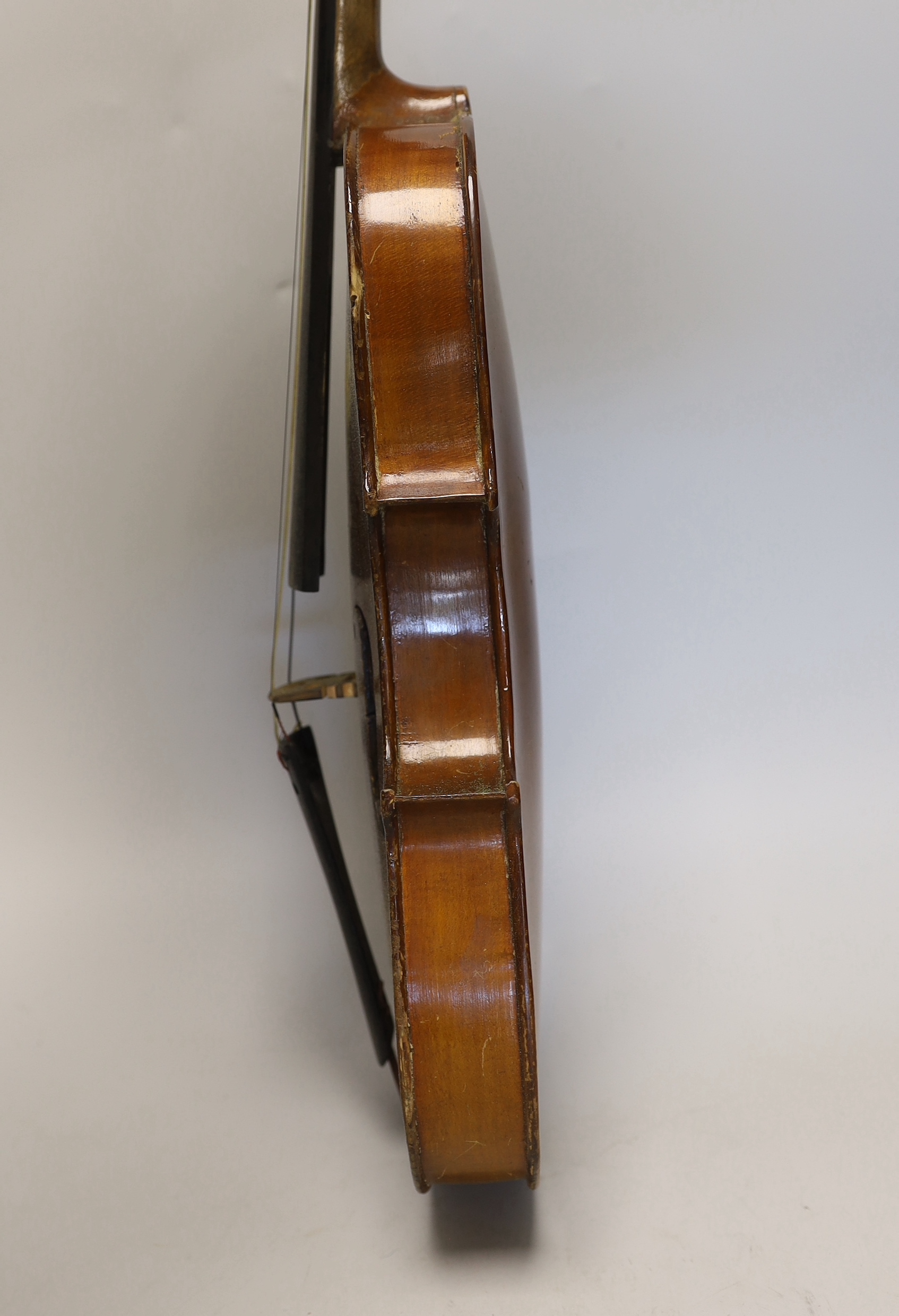 A three quarter size German violin, in case violin 56cm long